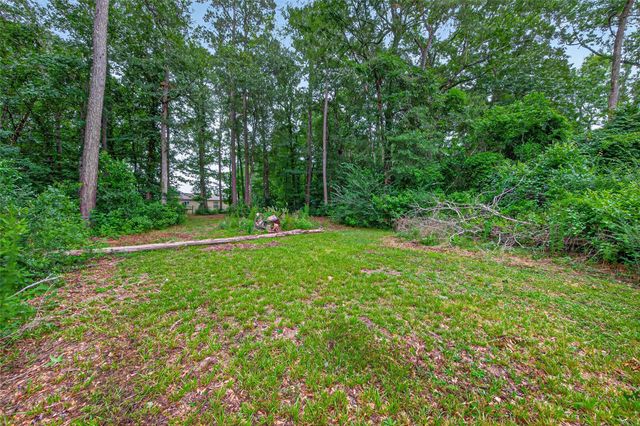 241 Quail Creek Drive, Cleveland, TX 77328