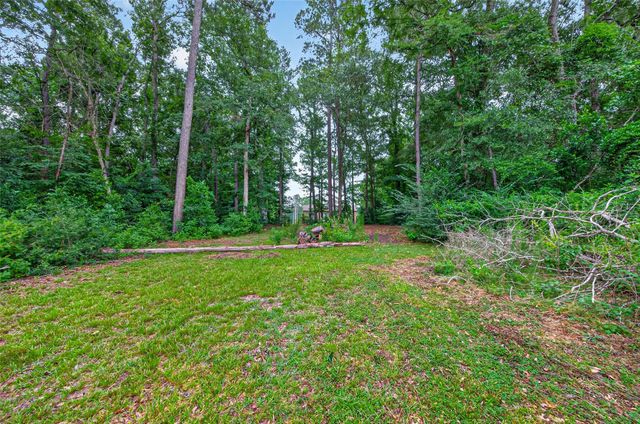 241 Quail Creek Drive, Cleveland, TX 77328