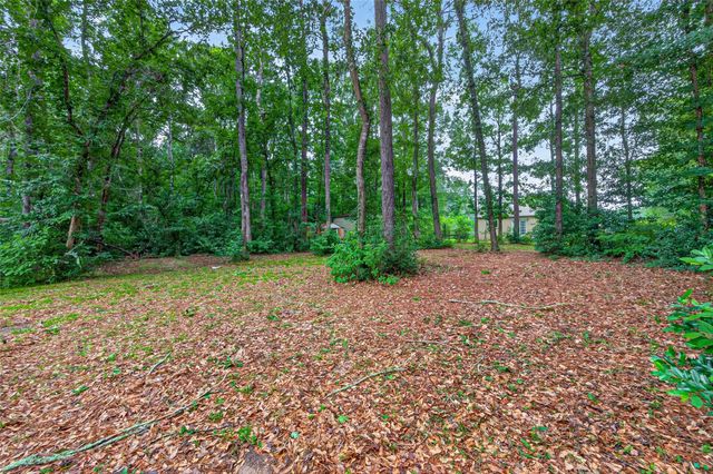 241 Quail Creek Drive, Cleveland, TX 77328