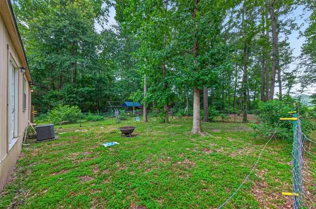 241 Quail Creek Drive, Cleveland, TX 77328