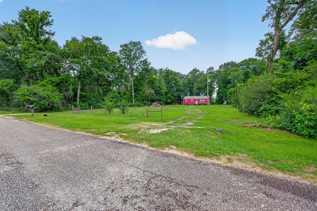 241 Quail Creek Drive, Cleveland, TX 77328