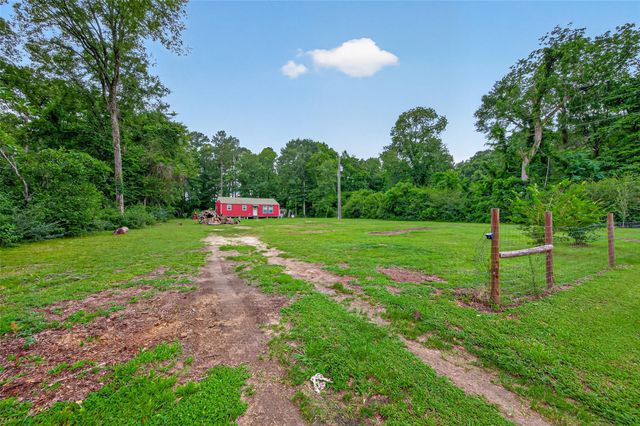 241 Quail Creek Drive, Cleveland, TX 77328