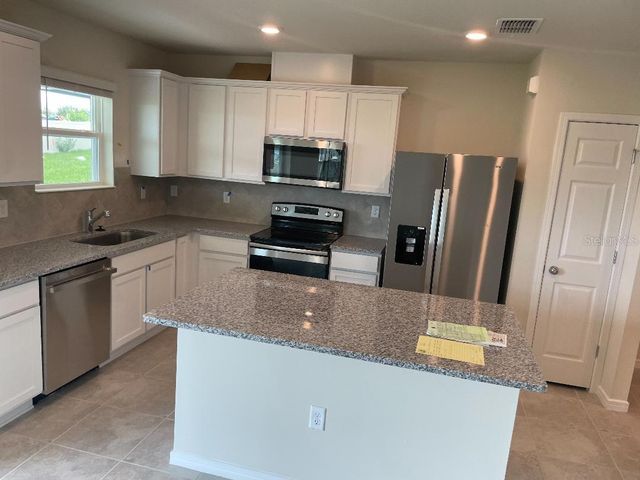 1148 SUGARWOOD STREET, Davenport, FL 33837