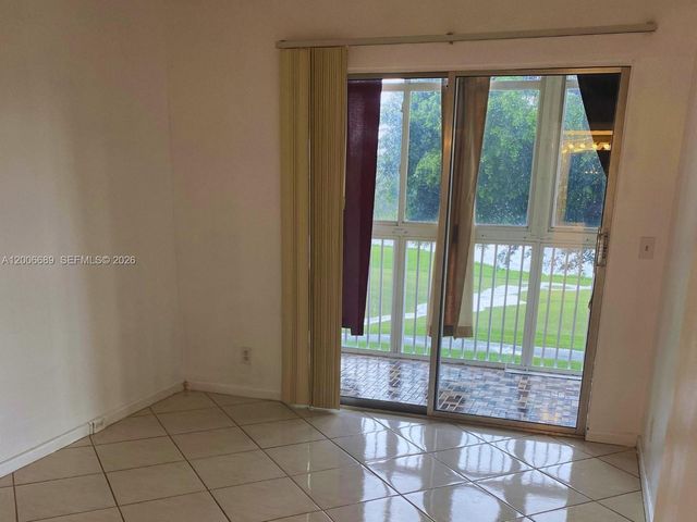13550 SW 6th Court 308A, Pembroke Pines, FL 33027