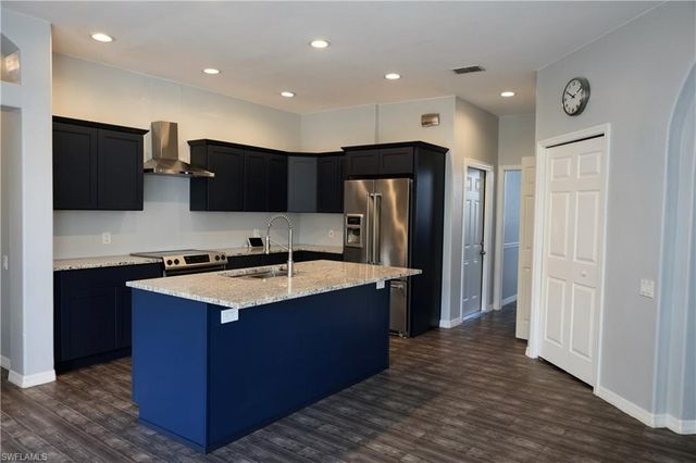 563 Chamonix AVE S, Lehigh Acres, FL 33974