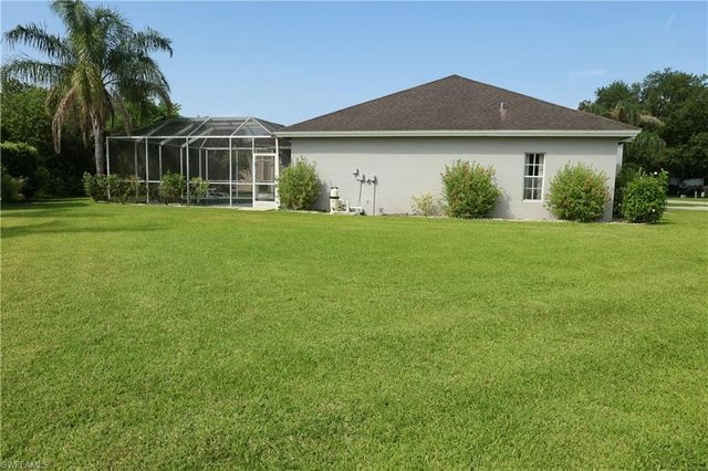 563 Chamonix AVE S, Lehigh Acres, FL 33974