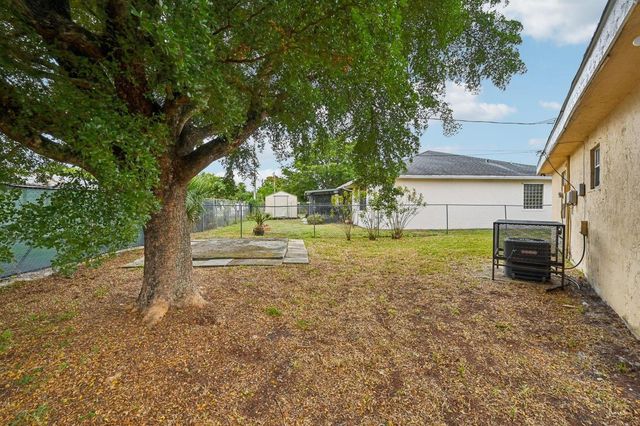 5618 Cinnamon Drive, West Palm Beach, FL 33415
