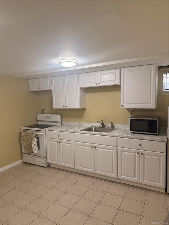49 Long Beach Avenue 1, Roosevelt, NY 11575