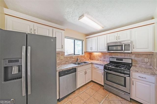 3884 Wood Path Drive, Stone Mountain, GA 30083