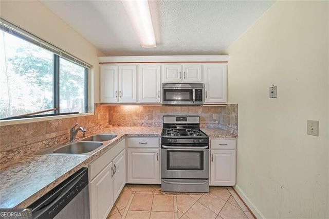 3884 Wood Path Drive, Stone Mountain, GA 30083