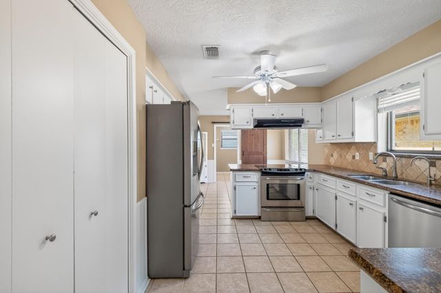 10070 Woodcreek Circle, Willis, TX 77318