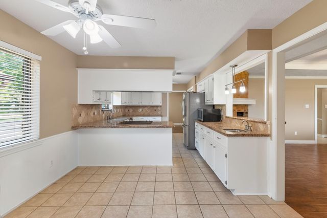10070 Woodcreek Circle, Willis, TX 77318