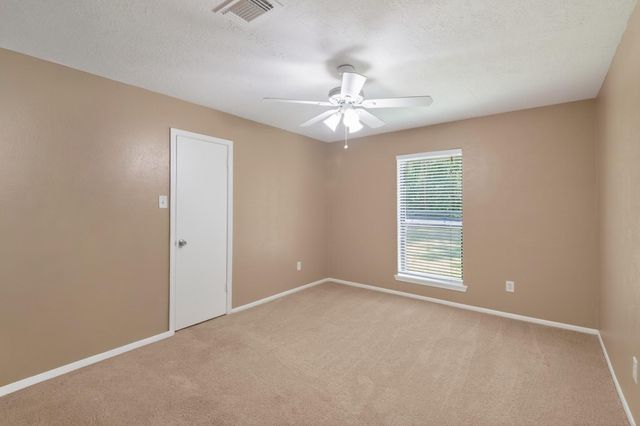 10070 Woodcreek Circle, Willis, TX 77318
