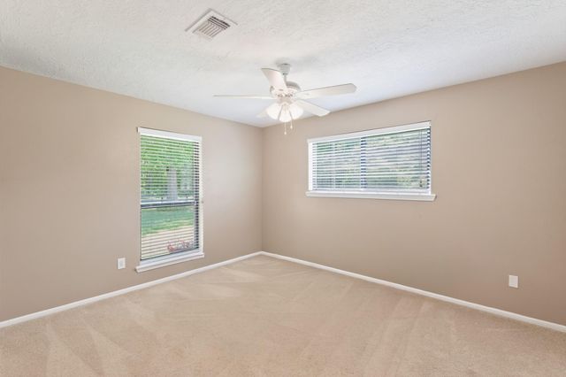 10070 Woodcreek Circle, Willis, TX 77318