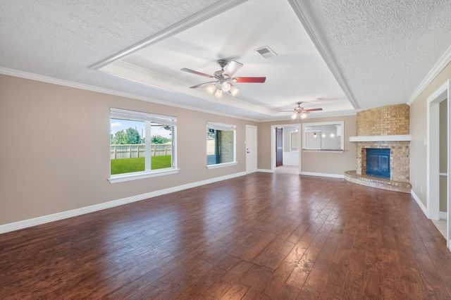 10070 Woodcreek Circle, Willis, TX 77318