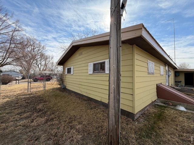 117 Pine St, Log Lane Village, CO 80705
