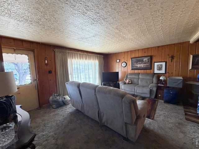 117 Pine St, Log Lane Village, CO 80705