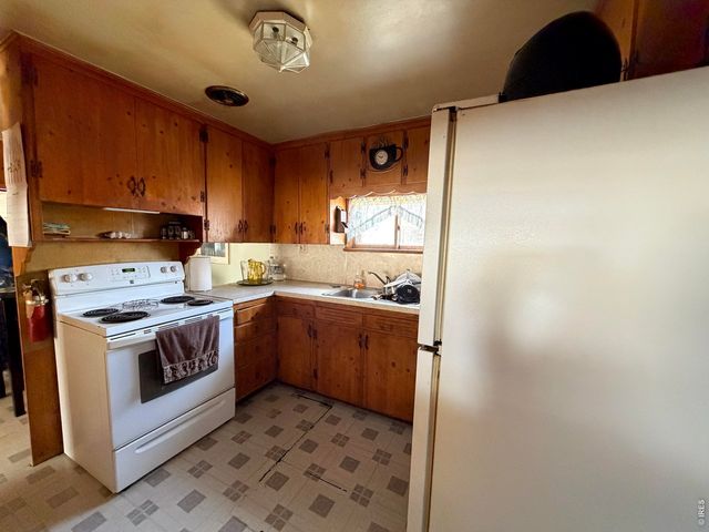 117 Pine St, Log Lane Village, CO 80705