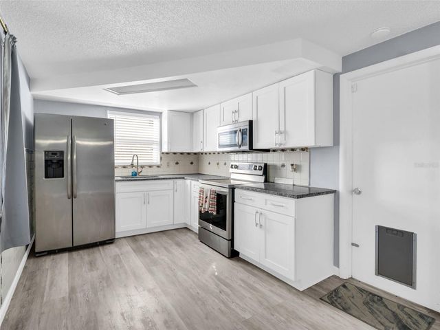 1242 VIKING DRIVE, Holiday, FL 34691