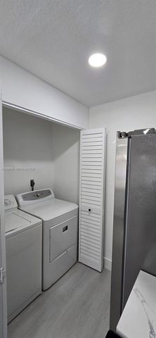 9612 Grand Canal Drive, Miami, FL 33174
