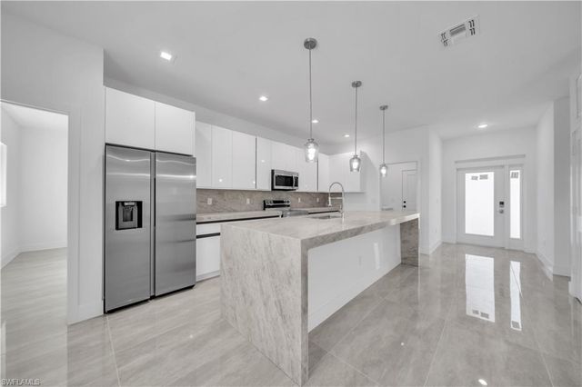 828 Genoa AVE S, Lehigh Acres, FL 33974