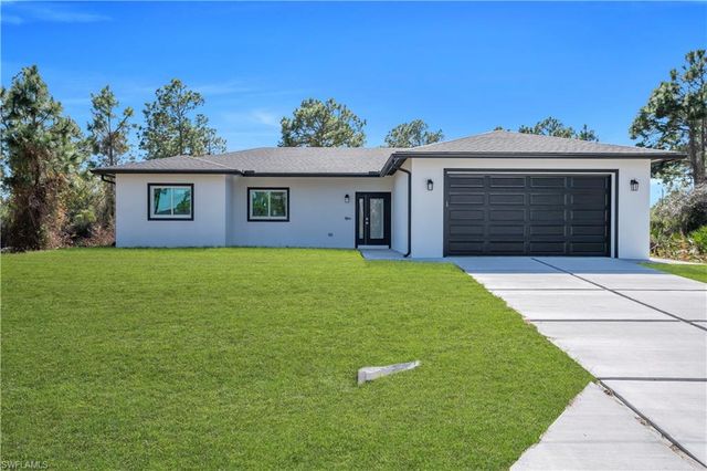 828 Genoa AVE S, Lehigh Acres, FL 33974
