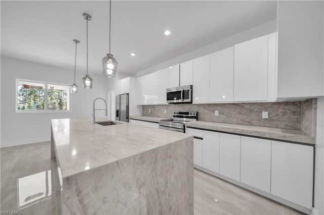 828 Genoa AVE S, Lehigh Acres, FL 33974