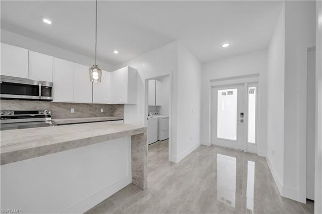 828 Genoa AVE S, Lehigh Acres, FL 33974