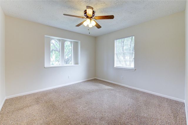 9115 Taidswood Drive, Spring, TX 77379