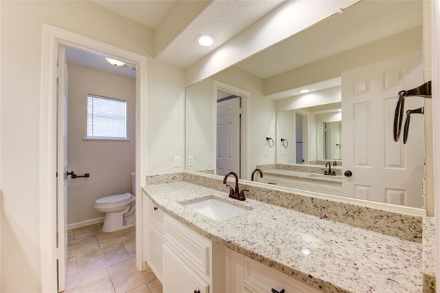 9115 Taidswood Drive, Spring, TX 77379