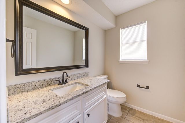 9115 Taidswood Drive, Spring, TX 77379