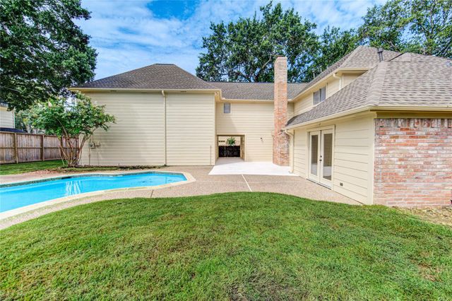 9115 Taidswood Drive, Spring, TX 77379