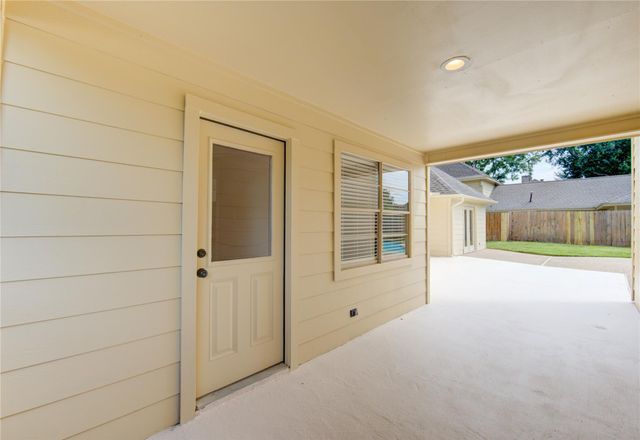 9115 Taidswood Drive, Spring, TX 77379