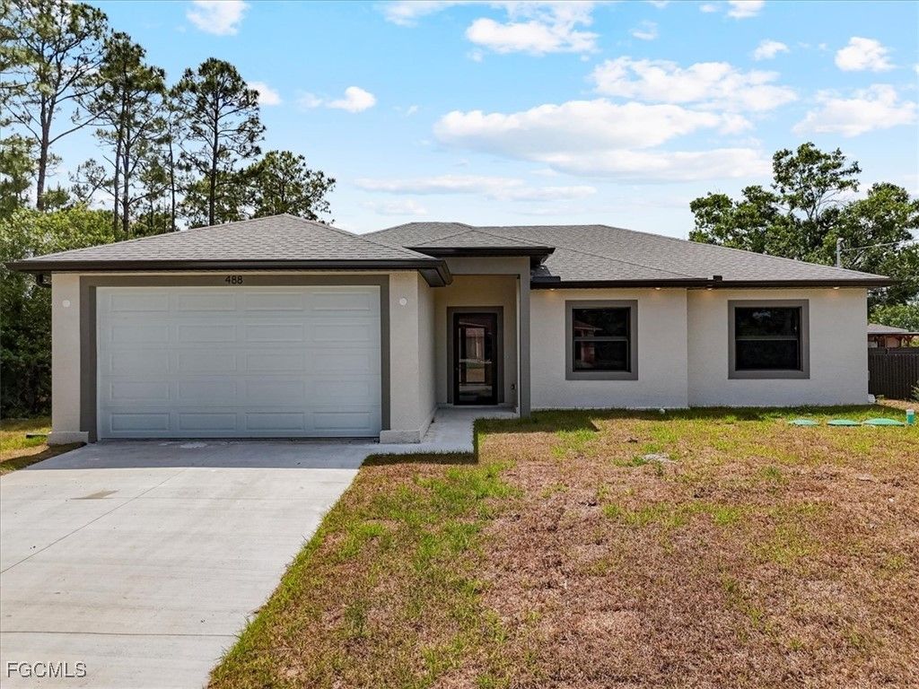 1051 Milwaukee BLVD, Lehigh Acres, FL 33974
