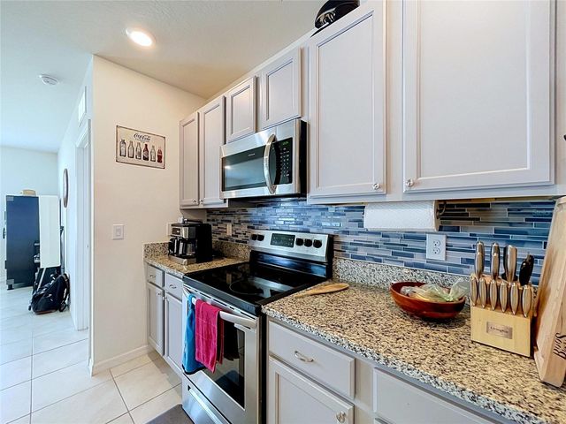 148 LUDISIA LOOP, Davenport, FL 33837