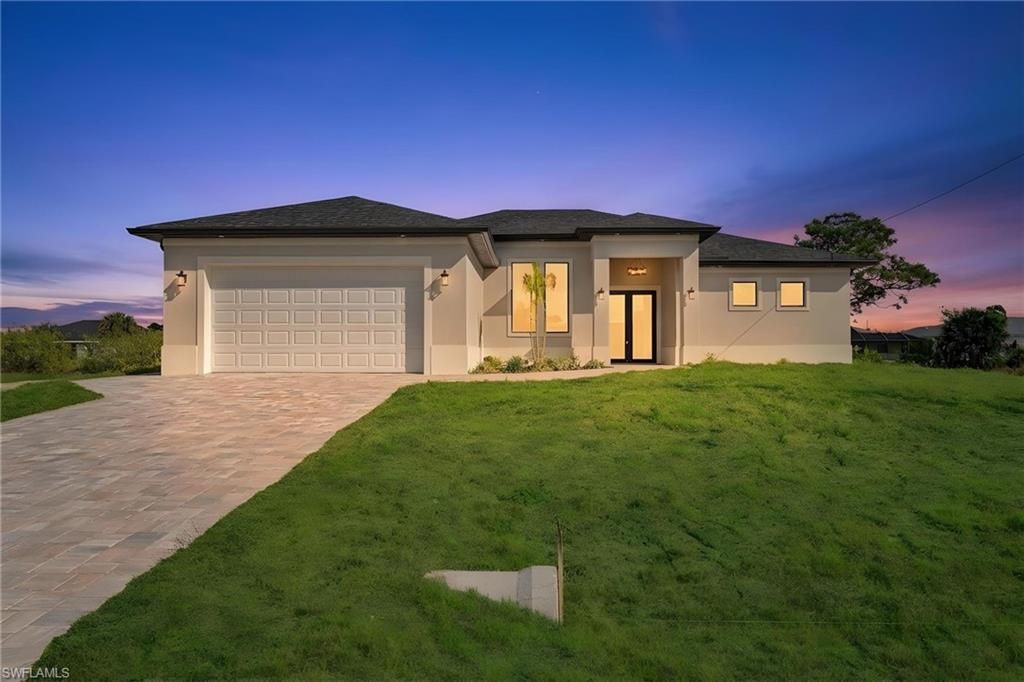 411 NE 25th ST, CAPE CORAL, FL 33909 — exterior