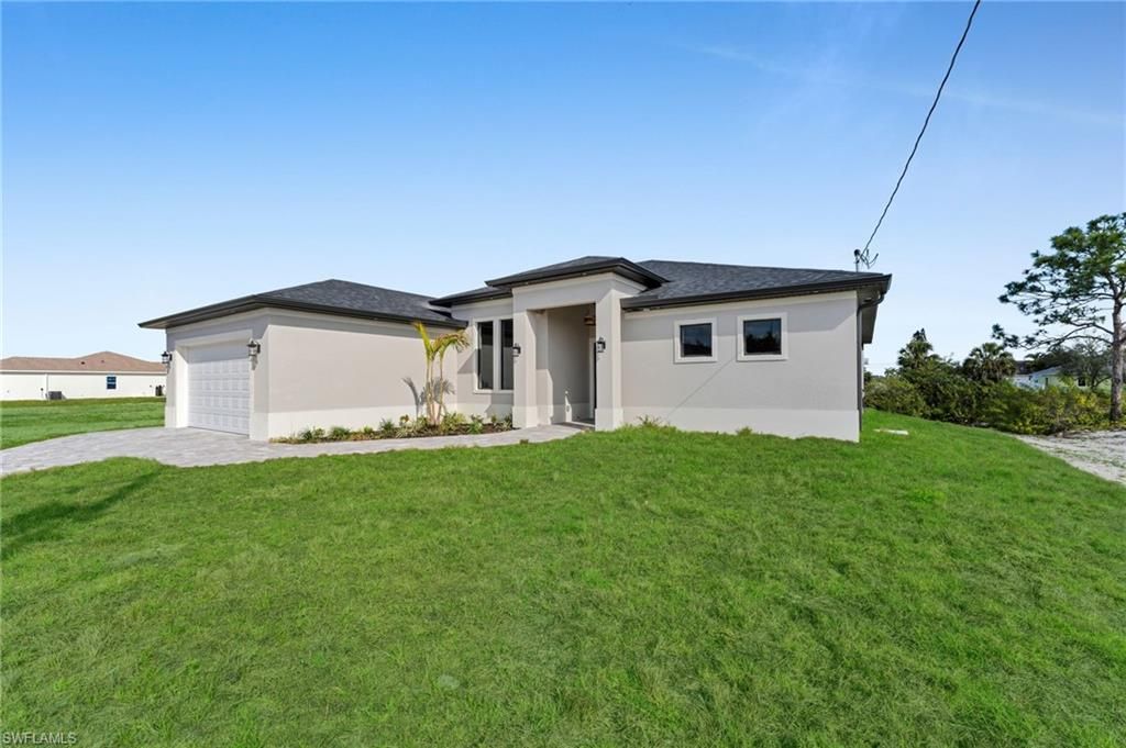411 NE 25th ST, CAPE CORAL, FL 33909 — photo 3
