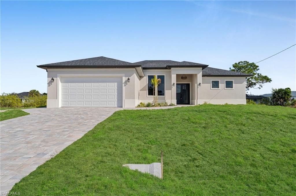411 NE 25th ST, CAPE CORAL, FL 33909 — photo 4