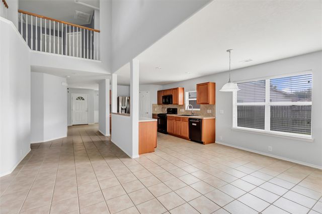 4601 Woodspring Acres Court, Houston, TX 77345