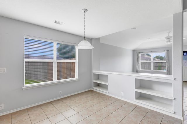 4601 Woodspring Acres Court, Houston, TX 77345