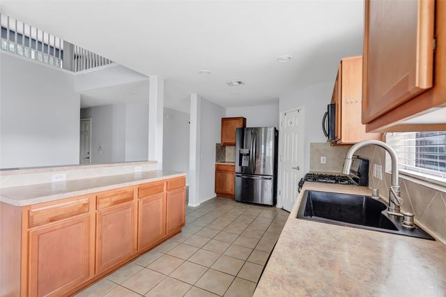 4601 Woodspring Acres Court, Houston, TX 77345