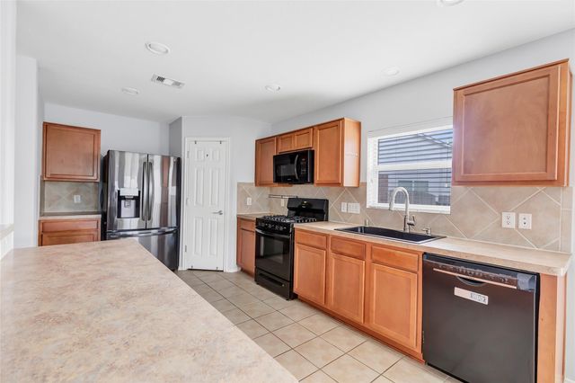 4601 Woodspring Acres Court, Houston, TX 77345