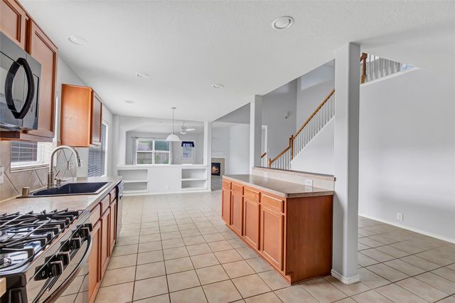 4601 Woodspring Acres Court, Houston, TX 77345