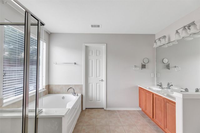 4601 Woodspring Acres Court, Houston, TX 77345