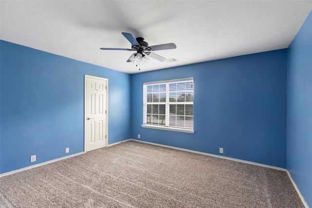 4601 Woodspring Acres Court, Houston, TX 77345