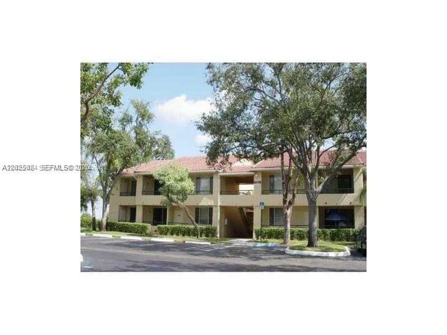 631 Lyons Rd 12205, Coconut Creek, FL 33063