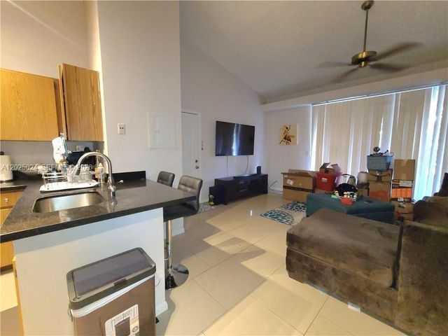 631 Lyons Rd 12205, Coconut Creek, FL 33063