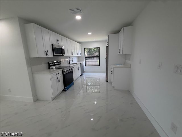 15 Louisiana RD, Lehigh Acres, FL 33936