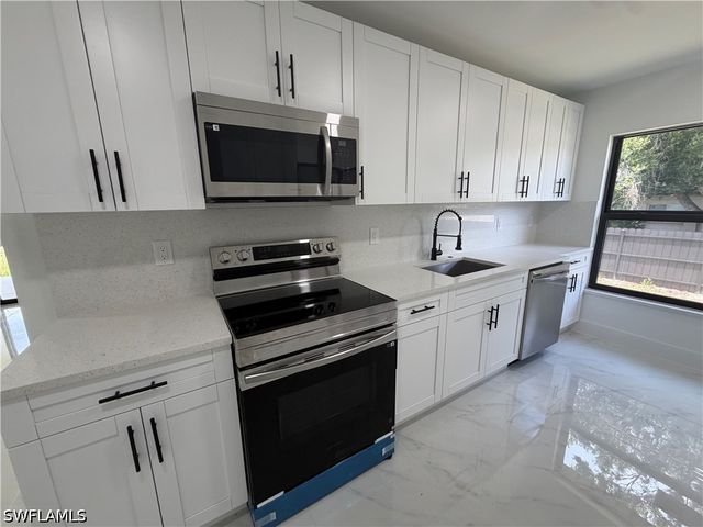 15 Louisiana RD, Lehigh Acres, FL 33936