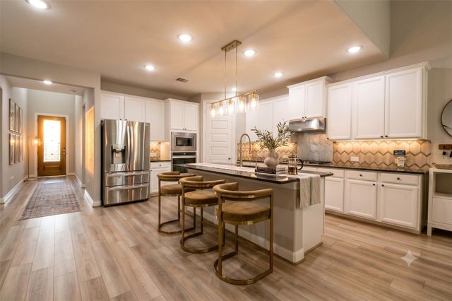 2034 Woodland Pine Court, Conroe, TX 77384